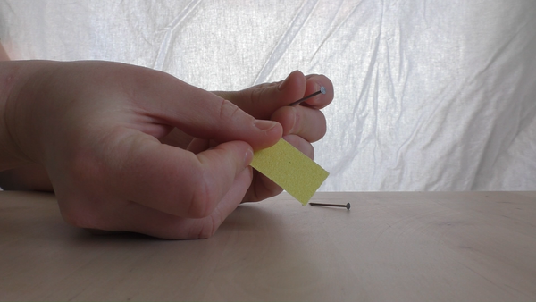 Cuivrer un clou avec une pi ce Clou gratte.png